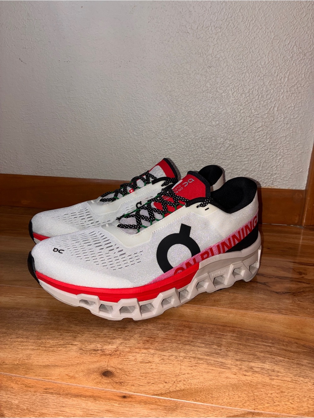 On Cloud Men’s Cloudmonster Athletic Running Shoe, ivory/silver/red- size 9.5